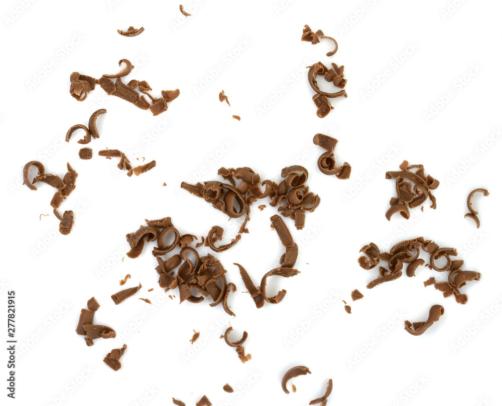 Grated chocolate. Heap of ground chocolate isolated on white background with clipping path, closeup.