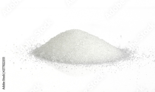 Heap of granulated sugar isolated on white background.