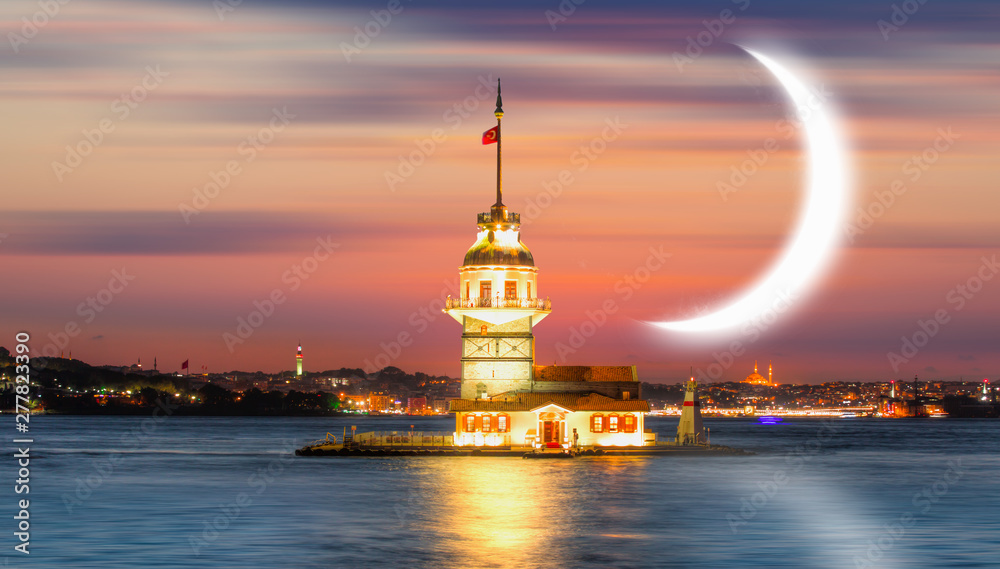 Fototapeta premium Istanbul Maiden Tower (kiz kulesi) at sunset in the background crescent moon