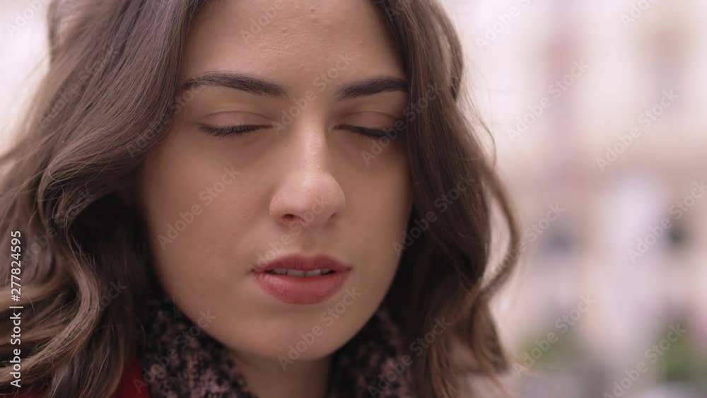 beautiful sensual young woman turning,staring at camera-macro-outdoor beautiful sensual young woman turning,staring at camera-macro-outdoor