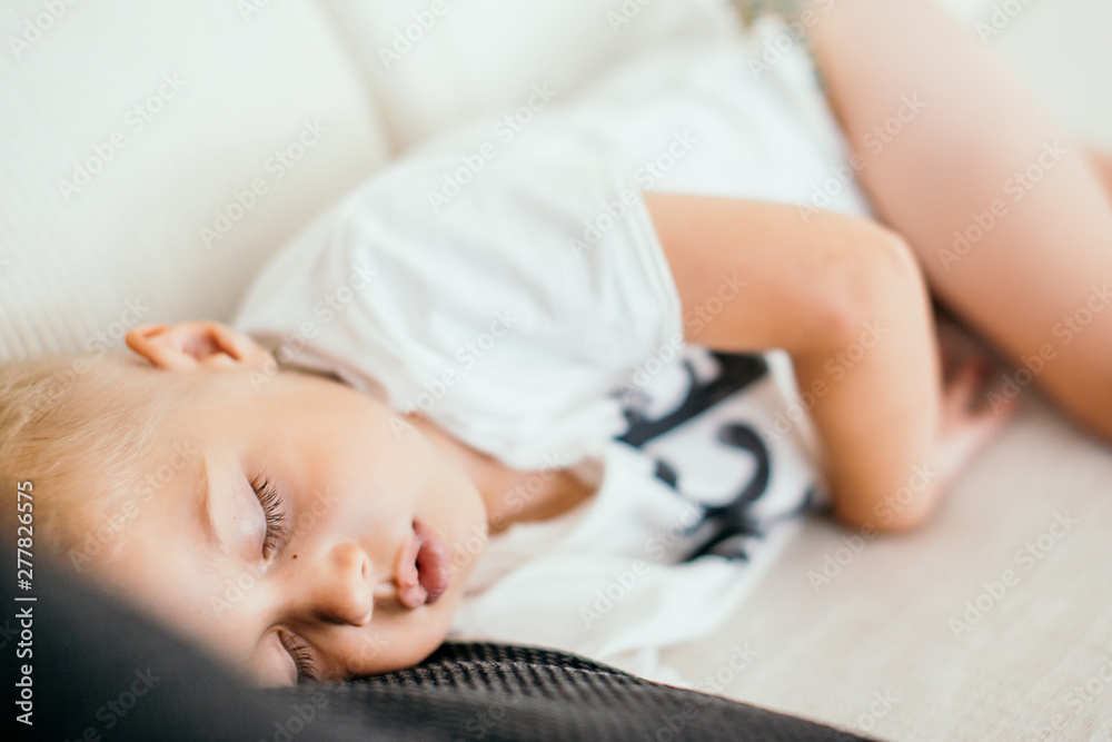 Kid sleeping on a sofa. Kid sleeping on a sofa.