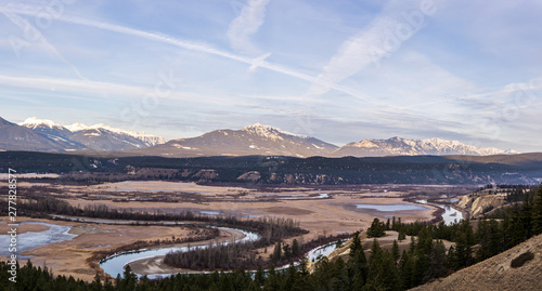 early spring morning at columbia river valleynear Radium Hot Springs with rocky mountains on the background. photo