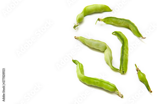 Photos Ugly homegrown pea on a white background with copy space