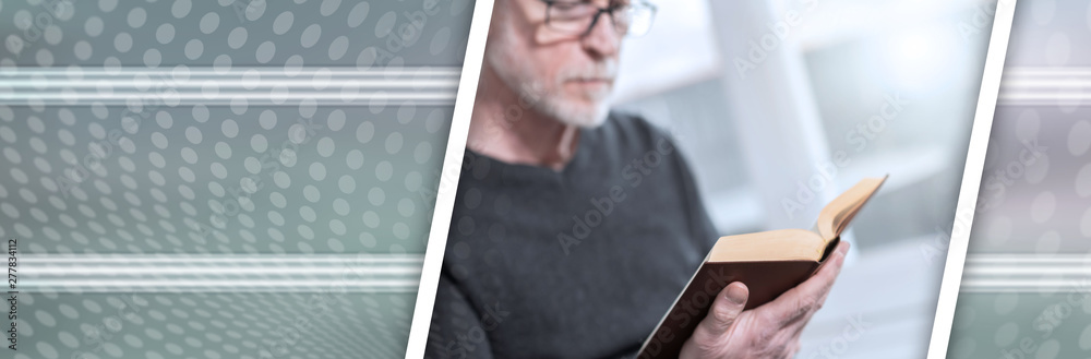 Man reading a book; panoramic banner Man reading a book; panoramic banner