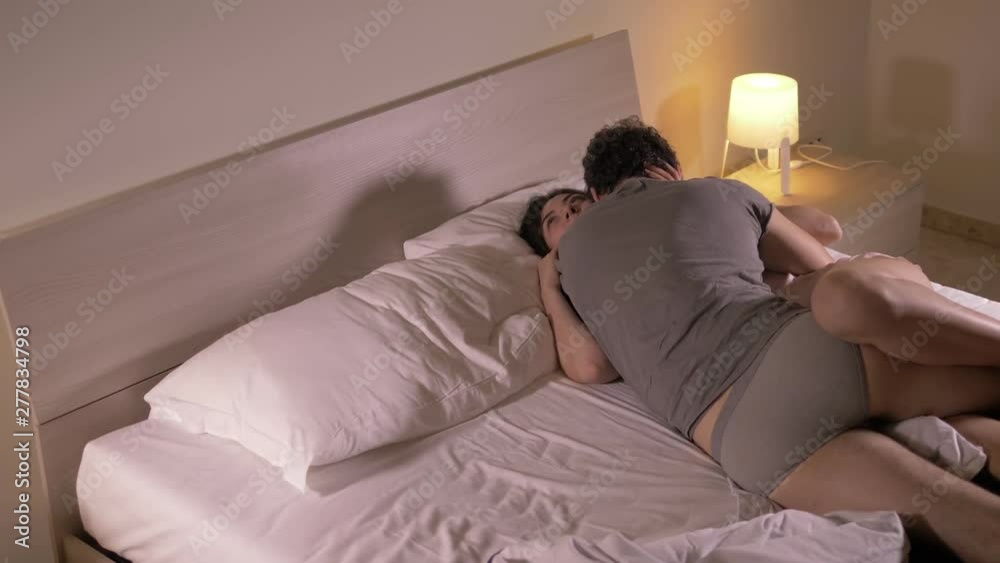 Night Sleeping Sex - young passionate lovers having sex in bed at night.Attraction,passion,love  Stock Video | Adobe Stock