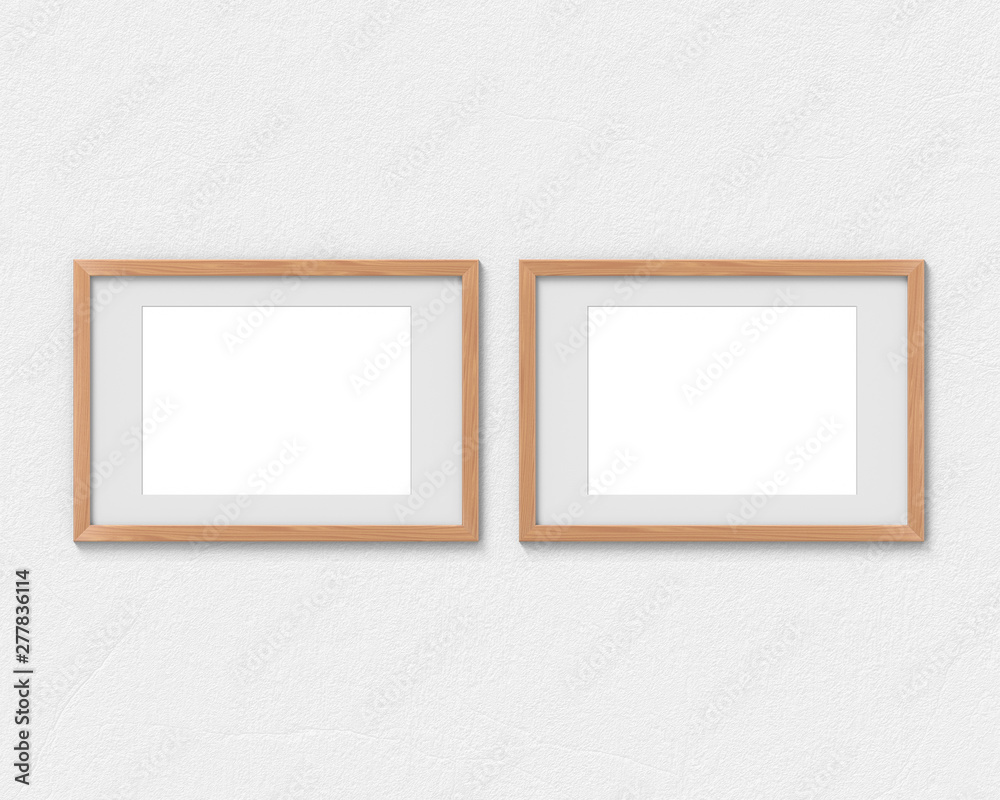 Set of 2 horizontal wooden frames mockup with a border hanging on the wall. Empty base for picture or text. 3D rendering.