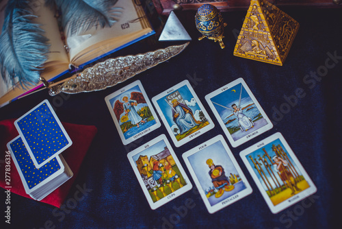 Mystical atmosphere of tarot card on the table, esoteric concept, fortune telling and predictions 