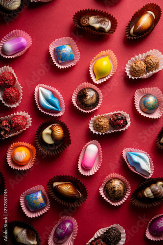 Background with chocolate bombons above