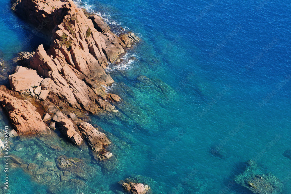 blue sea lagoon with rocks in the mediterranean sea, aerial view