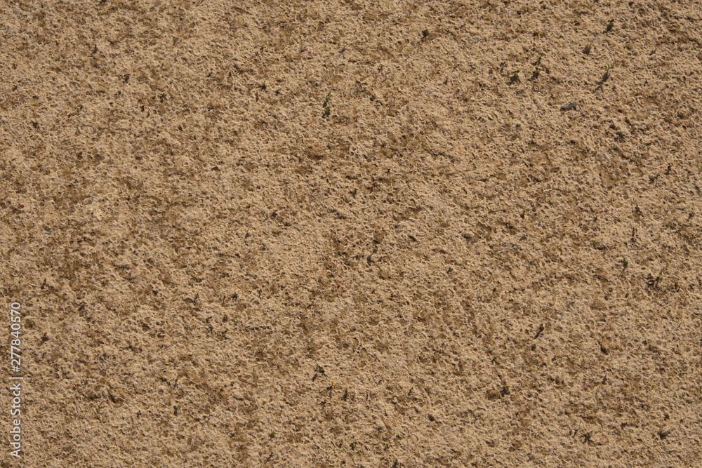 Sand texture. Yellow-brown abstract background. Summer. Sunny day. Sand texture. Yellow-brown abstract background. Summer. Sunny day.