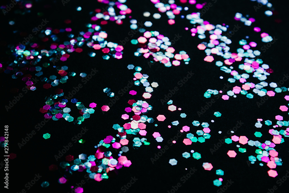 Multicolored shiny confetti. Multicolored shiny confetti.