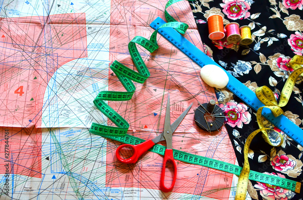 Essentials of the measuring and cutting textile or fine cloth. Work