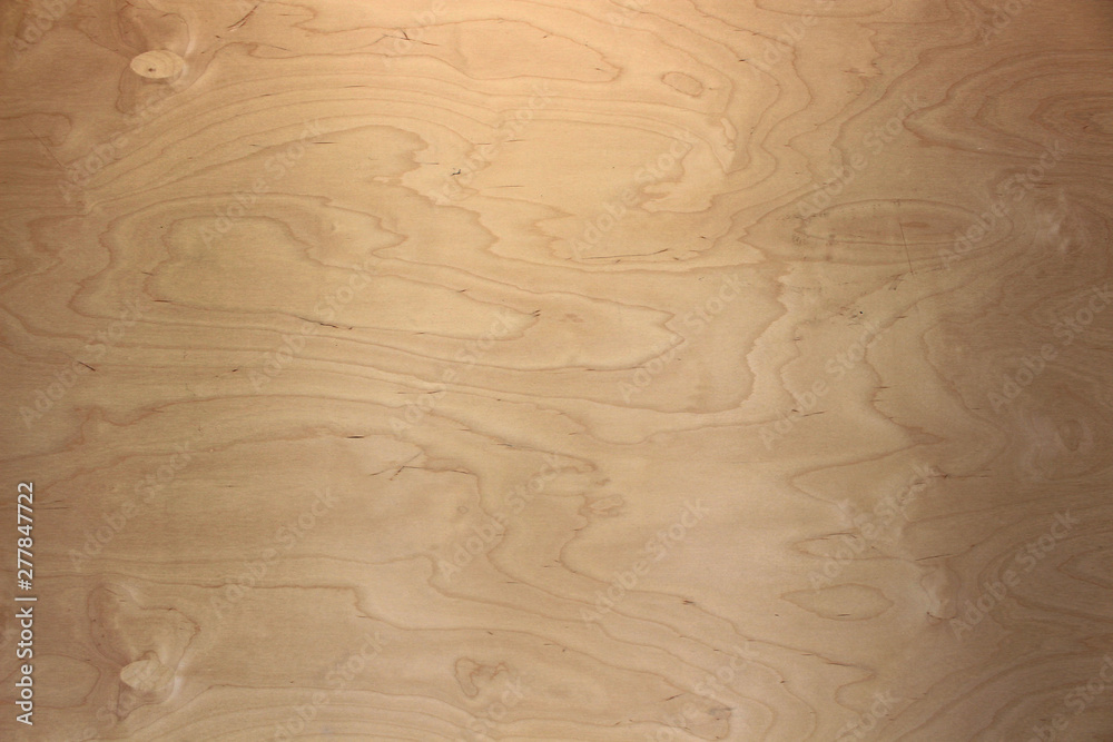 Wood texture background. Warm yellow reddish tint of wood to create a cozy mood Wood texture background. Warm yellow reddish tint of wood to create a cozy mood