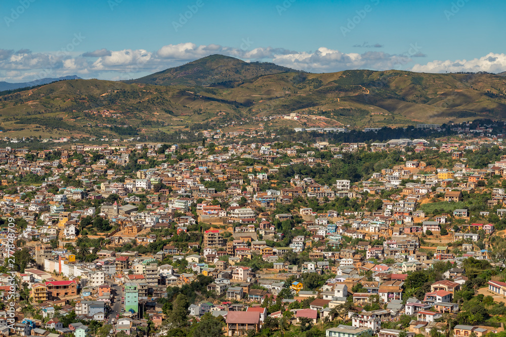 City of Fianarantsoa, Madagascar highlands. Very detailed high viewpoint cityscape with the mountains and clouds on the background