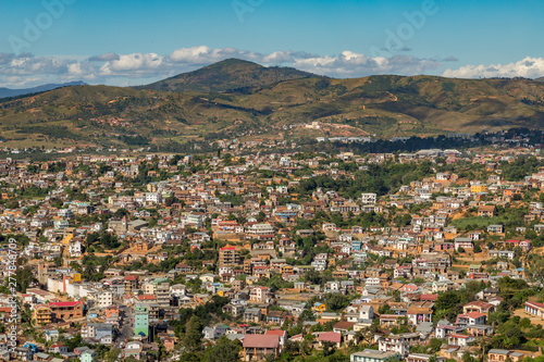 City of Fianarantsoa, Madagascar highlands. Very detailed high viewpoint cityscape with the mountains and clouds on the background © Frank