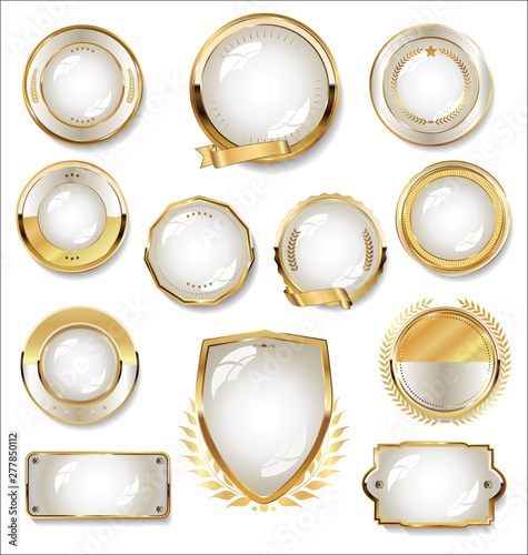 Collection of gold and white badge and labels
