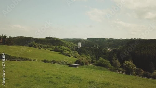 St. Matthias Church and castle on a hill in Reifferscheid Germany Aerial  photo