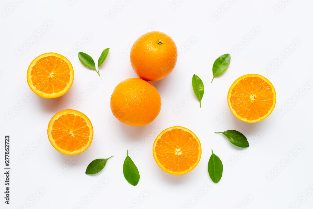 Fresh orange citrus fruit with leaves isolated on white background.