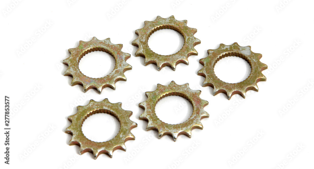 metal gear wheels on white ground metal gear wheels on white ground