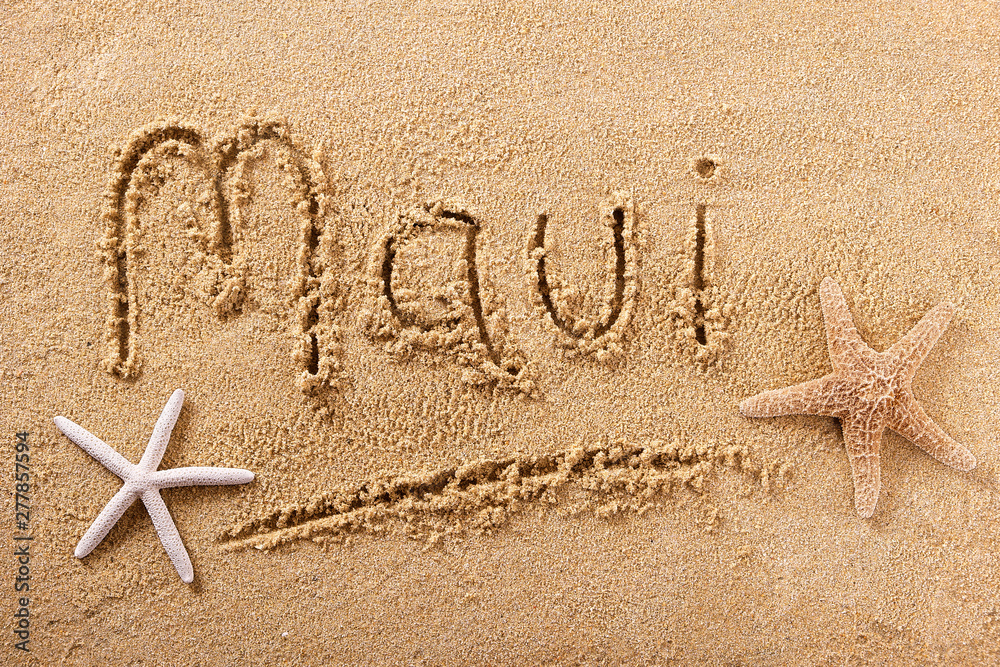 Maui word written in sand sign writing drawing drawn on a sunny hawaiian summer beach with starfish holiday vacation travel destination message photo Maui word written in sand sign writing drawing drawn on a sunny hawaiian summer beach with starfish holiday vacation travel destination message photo