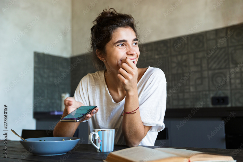 Attractive young woman having healthy breakfast Attractive young woman having healthy breakfast