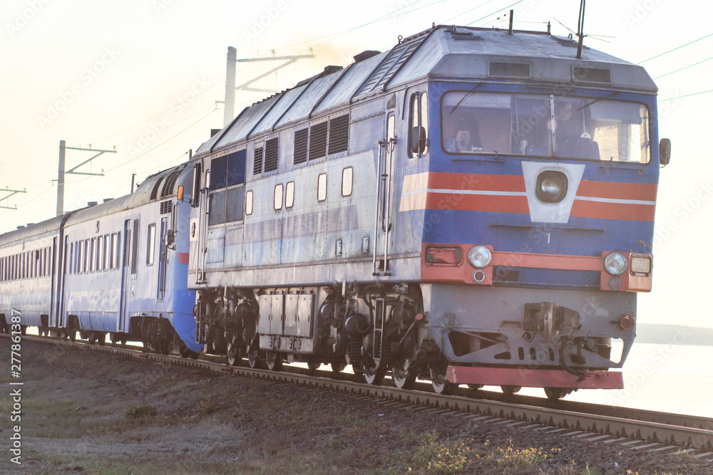 Passenger diesel train traveling speed railway wagons journey light