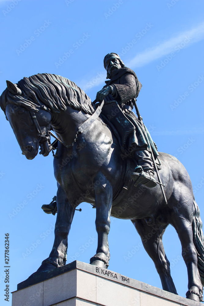Obraz premium National memorial on Vitkov hill, Zizkov, Prague, Czech Republic / Czechia - Equestrian statue of Jan Zizka, legend and famous hero. Bronze sculpture of rider and horse on pedestal
