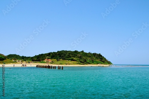 Unique, wild beach of Cape of Rodon in Albania. Cape of Rodon (or Cape of Skanderbeg) with lovely beach and turquoise water. Albanian name: Kepi i Rodonit or Kepi i Skenderbeut