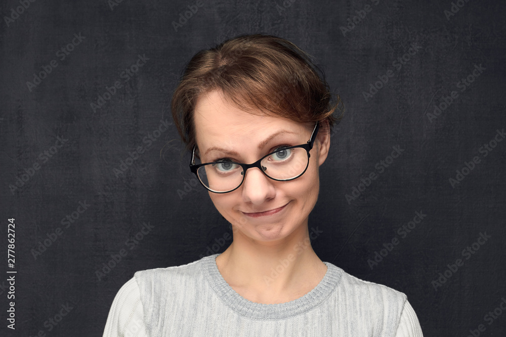 Portrait of cute and funny girl making naive childish face Portrait of cute and funny girl making naive childish face