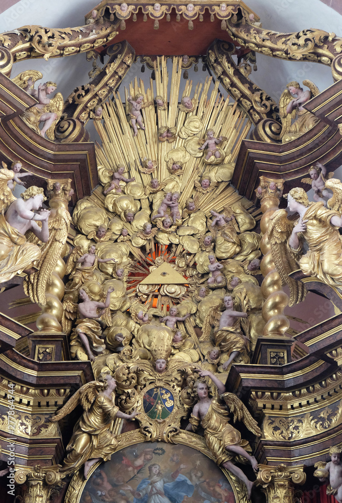 Fototapeta premium God's all-seeing eye on the main altar in Cistercian Abbey of Bronnbach in Reicholzheim near Wertheim, Germany