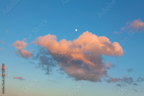 evening sky with clouds and moon