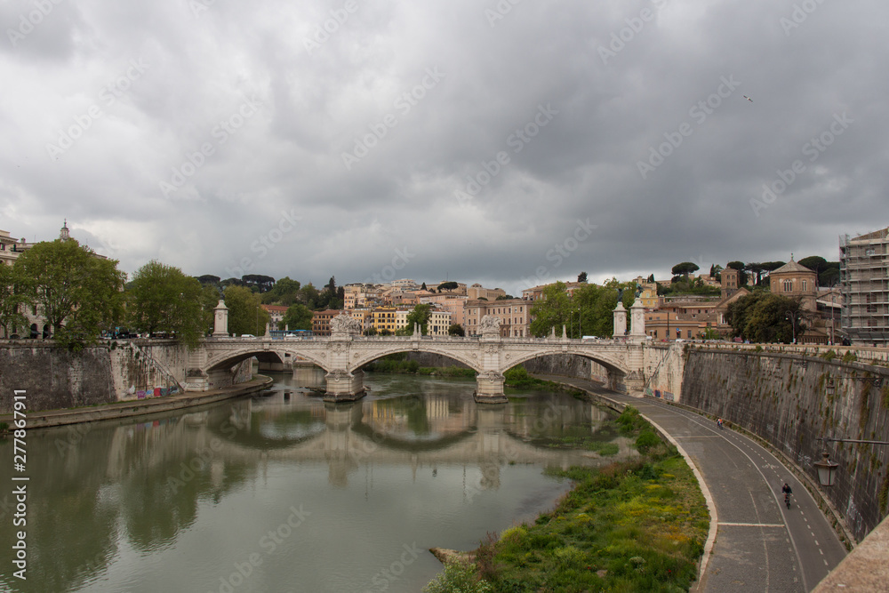 Ponte Vittorio Emanuele II with rainy clouds on background, Rome, Lazio, Italy.