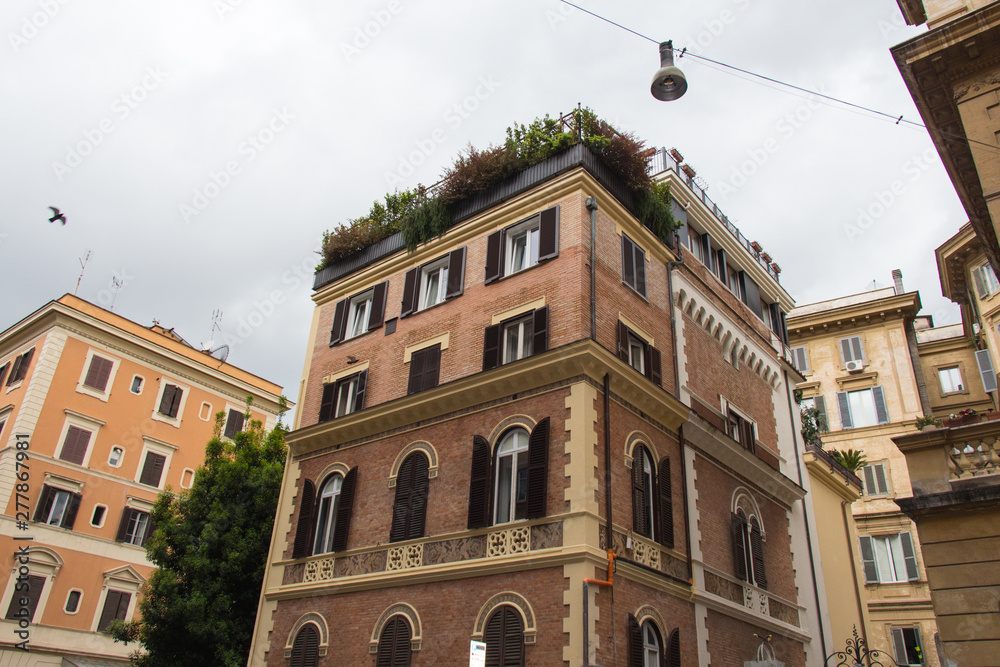 Facade of typical building in Rome, Lazio, Italy.