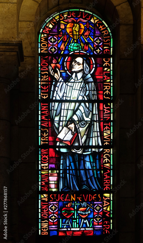 Saint John Eudes, stained glass window in Basilica of the Sacre Coeur, dedicated to the Sacred Heart of Jesus in Paris, France 