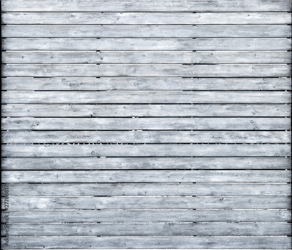 Bleached wood planks of fence texture