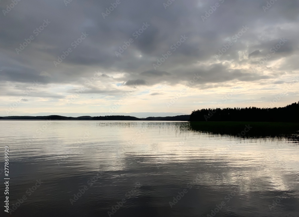 Gray sky reflection on the lake