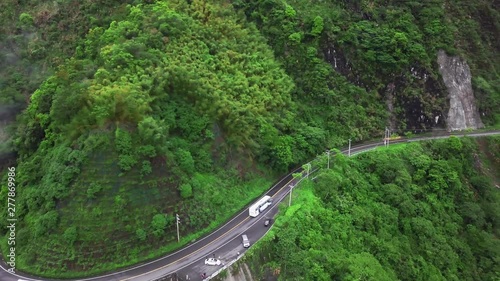 Transport Moving along Winding Curved Serpentine Mountain Road in Taroko Gorge National Park in Taiwan. Aerial View