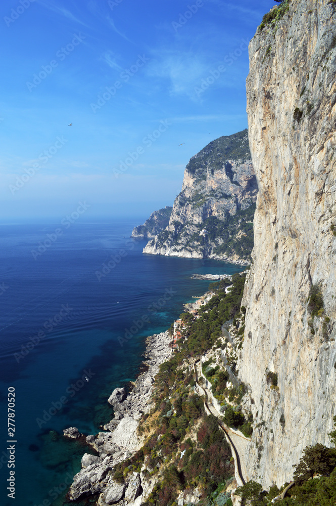 Seascape with rocky coast of the island of Capri.