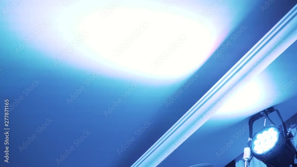 colorful light on the ceiling at a party