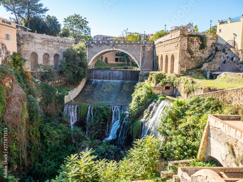 Old streets and buildings in the Gregorian Bridge ( Ponte Gregoriano ) area in Tivoli, Italy