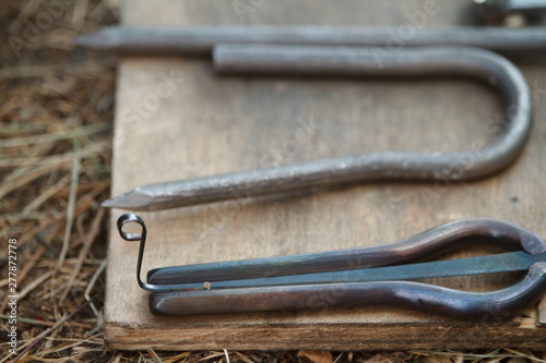 Close-up of a various parts of jaw harps, khomuses, folk musical instruments, selective focus photo