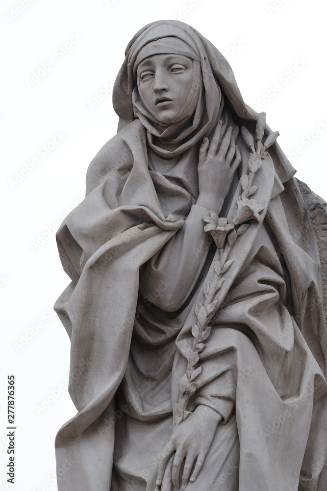 Statue of Saint Catherine of Siena near Sant Angelo Castle in Rome, Italy Statue of Saint Catherine of Siena near Sant Angelo Castle in Rome, Italy