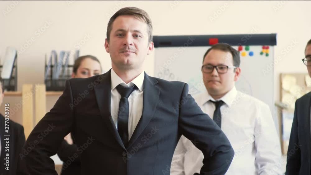 Smooth camera travel. Office workers stand proud line confident in their future and work. Professionals Smooth camera travel. Office workers stand proud line confident in their future and work. Professionals