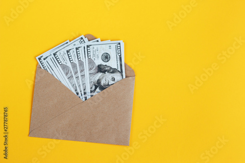 Wallpaper Mural Paper envelope with money on a yellow background. Torontodigital.ca