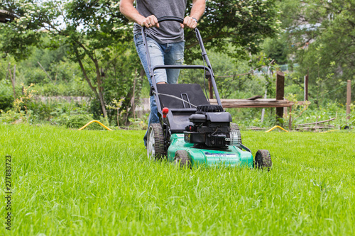 Man with lawn mower