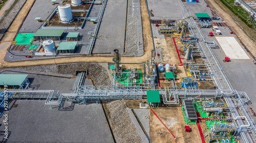 Aerial top view natural gas pipeline, gas industry, gas transport system, stop valves and appliances for gas pumping station.