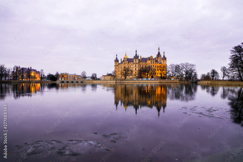 Schwerin, Germany. Schwerin Castle Palace (Schweriner Schloss), reflected on Schweriner See lake, a World Heritage Site in Mecklenburg-West Pomerania