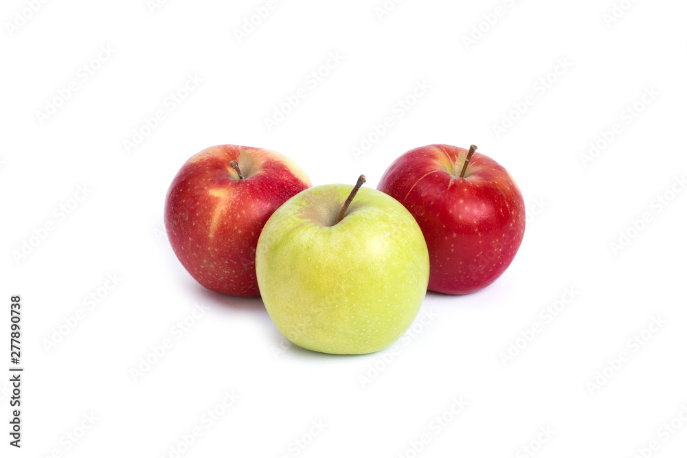 Red and green apples on a white background. Green and red apples juicy on an isolated background. A group of three ripe apples with on a white background.