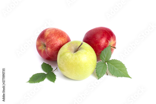 Red and green apples on a white background. Green and red apples juicy on an isolated background. A group of three apples with green leaves on a white background.