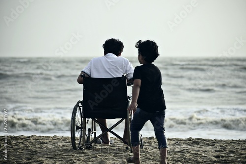 man and woman on beach